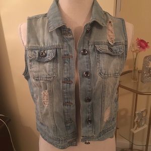 Distressed denim vest